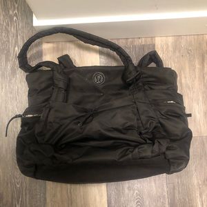 Lululemon black multi pocket bag